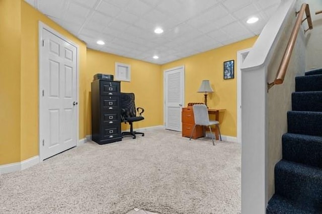 carpeted office space with recessed lighting and baseboards