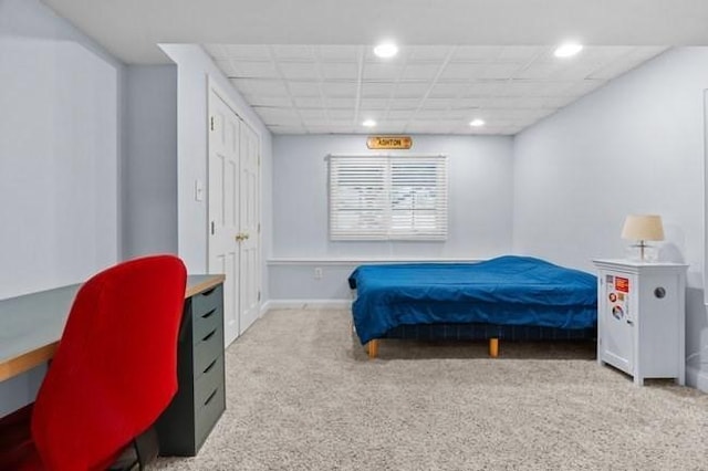 carpeted bedroom with recessed lighting and baseboards