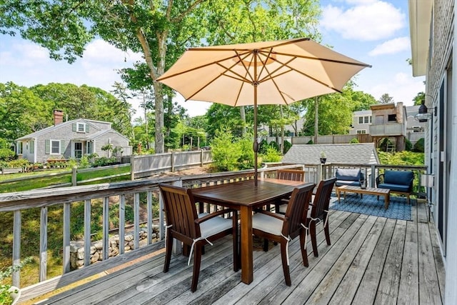37 Berkeley Dr, Falmouth, MA 02536 - deck featuring outdoor dining area and a fenced backyard