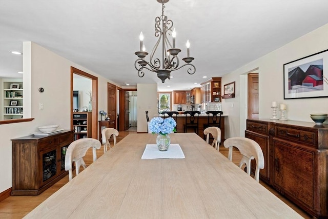37 Berkeley Dr, Falmouth, MA 02536 - dining space with a chandelier, light wood finished floors, and recessed lighting