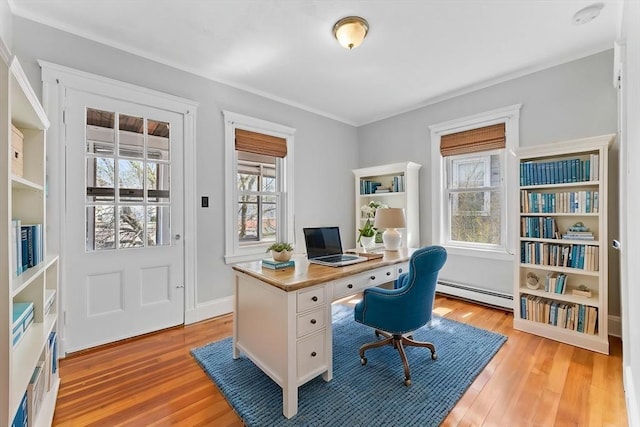 708 Belmont St Unit 708, Watertown, MA 02472 - office with light wood-style floors, a baseboard radiator, baseboards, and ornamental molding