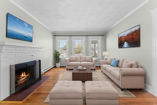 708 Belmont St Unit 708, Watertown, MA 02472 - living room with a brick fireplace, a baseboard heating unit, ornamental molding, and light wood finished floors