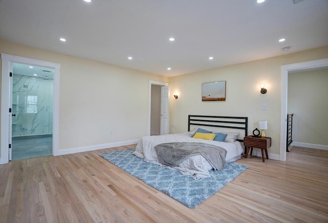 bedroom featuring recessed lighting, baseboards, and wood finished floors