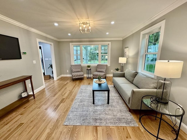 living area with light wood-style floors, recessed lighting, baseboards, and crown molding