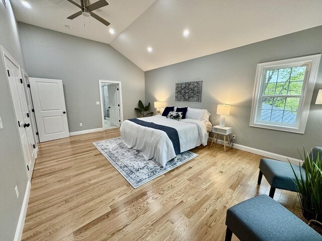 bedroom featuring baseboards, light wood-style floors, vaulted ceiling, recessed lighting, and a ceiling fan
