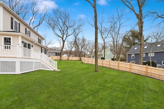 view of yard with stairs and a wooden deck