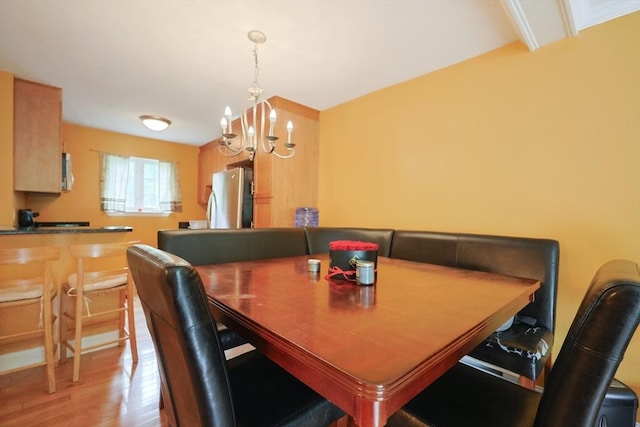6 Janet Rd Unit 10, Easton, MA 02375 - dining area featuring light wood-style flooring and a chandelier