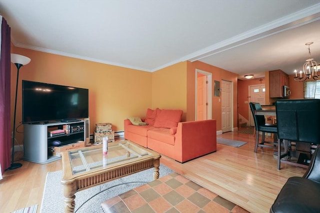 6 Janet Rd Unit 10, Easton, MA 02375 - living room with light wood-style floors, a chandelier, ornamental molding, a baseboard radiator, and baseboards