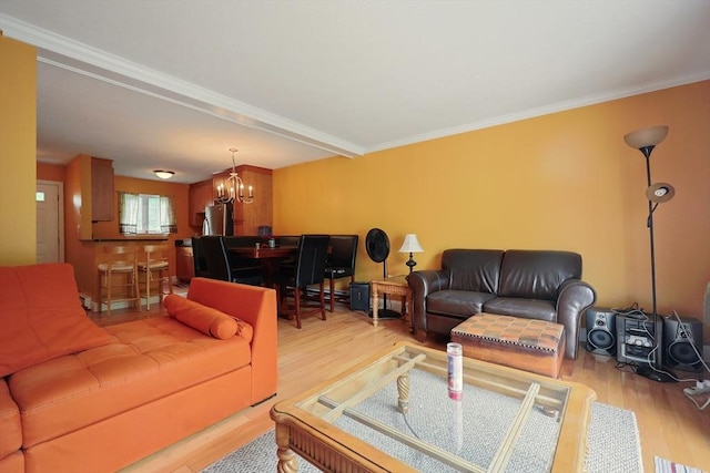 6 Janet Rd Unit 10, Easton, MA 02375 - living room with a chandelier, light wood-type flooring, and ornamental molding
