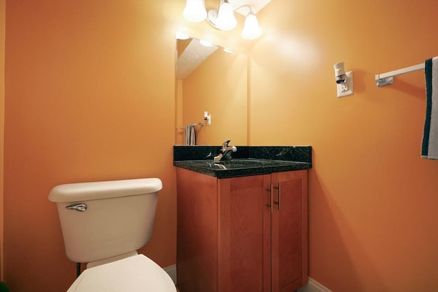6 Janet Rd Unit 10, Easton, MA 02375 - half bath with a chandelier, toilet, vanity, and baseboards