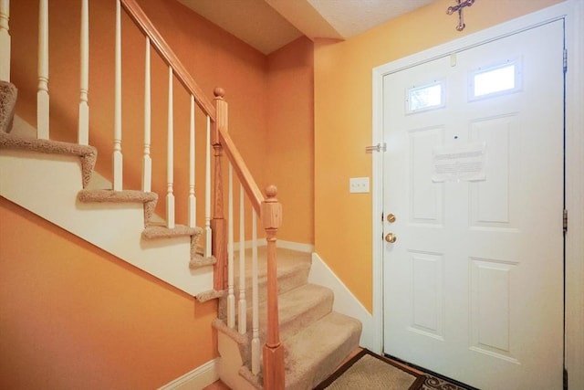 6 Janet Rd Unit 10, Easton, MA 02375 - entryway featuring stairway and baseboards