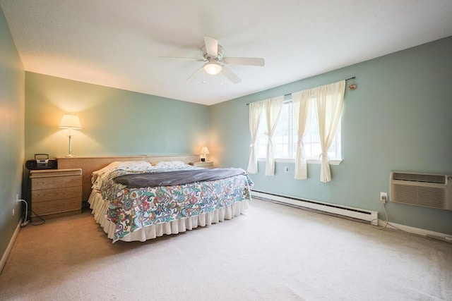 6 Janet Rd Unit 10, Easton, MA 02375 - bedroom with baseboard heating, carpet flooring, baseboards, a ceiling fan, and an AC wall unit