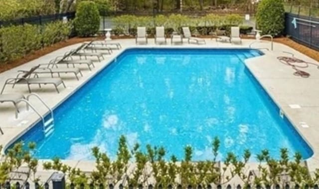 6 Janet Rd Unit 10, Easton, MA 02375 - community pool featuring a patio area and view of scattered trees