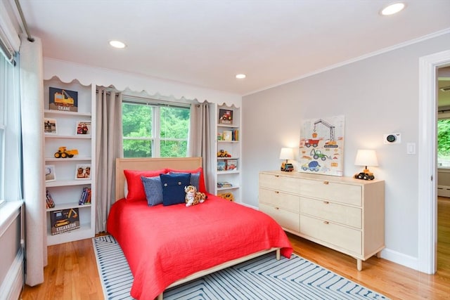 23 Green Lodge St, Canton, MA 02021 - bedroom featuring light wood finished floors, crown molding, recessed lighting, baseboards, and baseboard heating