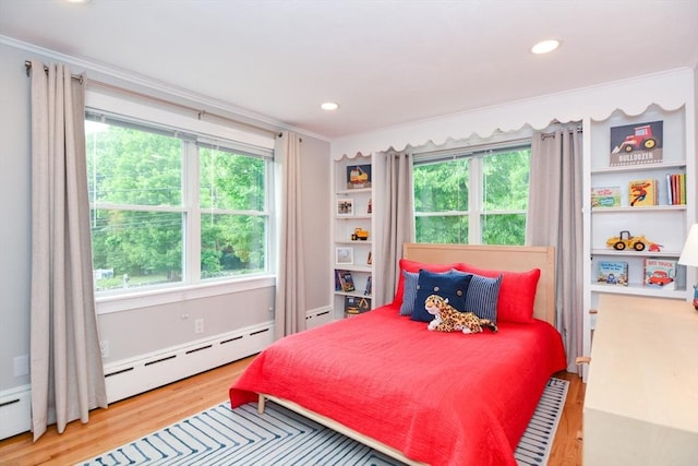 23 Green Lodge St, Canton, MA 02021 - bedroom with ornamental molding, wood finished floors, recessed lighting, and a baseboard radiator
