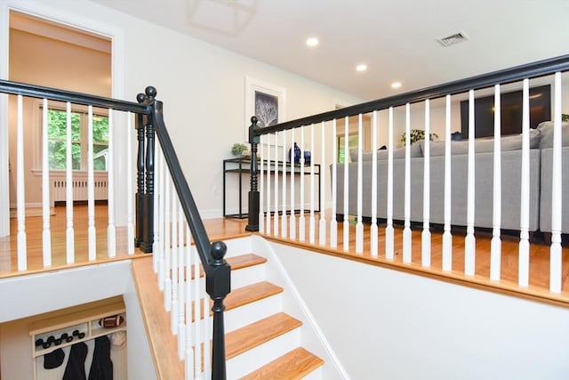 23 Green Lodge St, Canton, MA 02021 - staircase featuring radiator heating unit, recessed lighting, and baseboards