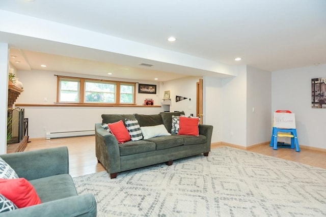 23 Green Lodge St, Canton, MA 02021 - living area featuring a baseboard radiator, wood finished floors, recessed lighting, and baseboards