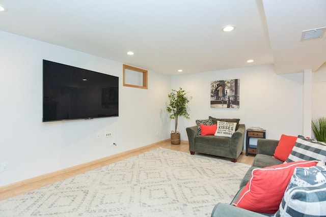 23 Green Lodge St, Canton, MA 02021 - living room with recessed lighting, wood finished floors, and baseboards