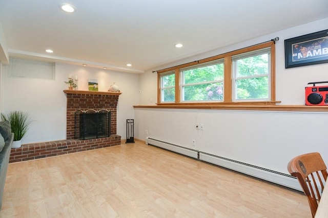 23 Green Lodge St, Canton, MA 02021 - unfurnished living room featuring baseboard heating, recessed lighting, wood finished floors, and a fireplace