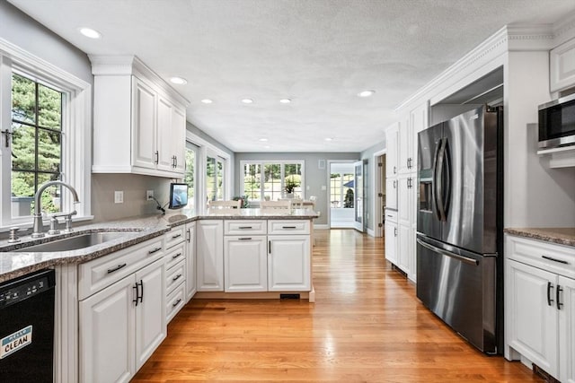 20 Stagecoach Rd, Topsfield, MA 01983 - kitchen with stainless steel appliances, a sink, light wood-type flooring, plenty of natural light, and recessed lighting