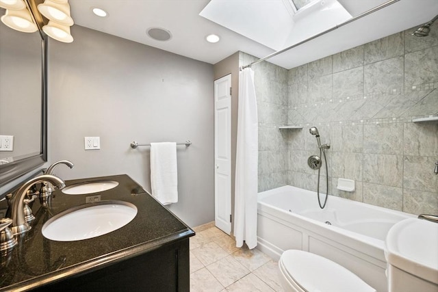 20 Stagecoach Rd, Topsfield, MA 01983 - full bathroom featuring shower / tub combo, double vanity, a skylight, baseboards, and toilet