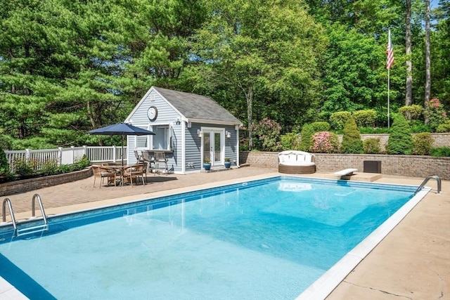 20 Stagecoach Rd, Topsfield, MA 01983 - view of pool featuring a storage structure, a patio area, an outdoor structure, and a diving board