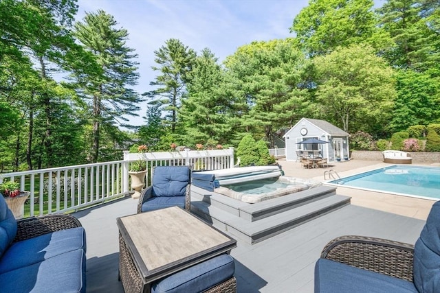 20 Stagecoach Rd, Topsfield, MA 01983 - view of swimming pool featuring a storage structure, an outdoor hot tub, an outbuilding, a patio, and an outdoor hangout area