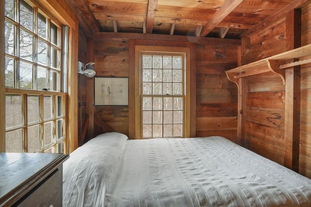 176 Middle Point Rd, West Tisbury, MA 02575 - bedroom with wooden walls, wooden ceiling with exposed beams, and multiple windows