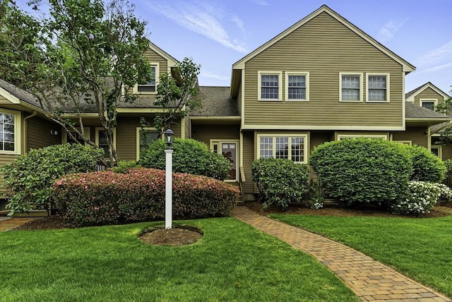 14 Weybridge Ln Unit 14, Hopkinton, MA 01748 - view of front of house with a front yard and a shingled roof