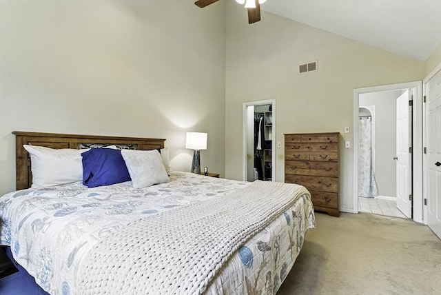 14 Weybridge Ln Unit 14, Hopkinton, MA 01748 - bedroom featuring carpet, a walk in closet, a closet, ensuite bathroom, and a ceiling fan