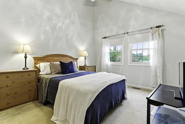 14 Weybridge Ln Unit 14, Hopkinton, MA 01748 - bedroom with light carpet, lofted ceiling, and baseboards