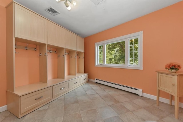 1 Fox Hunt Ln, Winchester, MA 01890 - mudroom with a baseboard radiator and baseboards