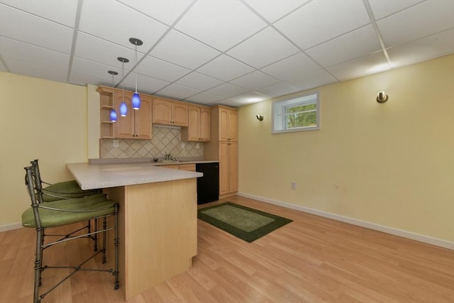 1 Fox Hunt Ln, Winchester, MA 01890 - kitchen featuring light wood finished floors, open shelves, light countertops, a peninsula, and a breakfast bar