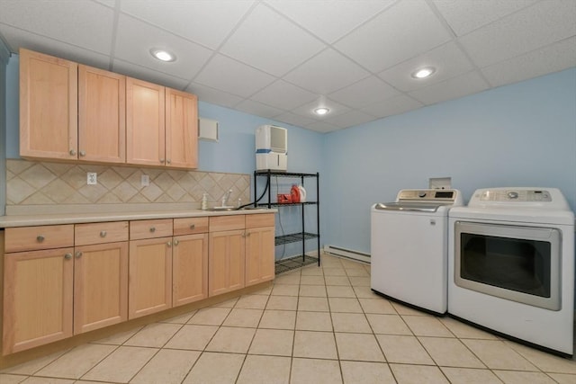 1 Fox Hunt Ln, Winchester, MA 01890 - laundry area featuring independent washer and dryer, baseboard heating, cabinet space, and recessed lighting