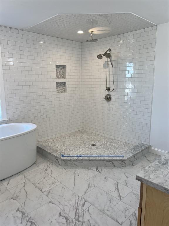 16 Clearview St, Grafton, MA 01536 - full bathroom featuring marble finish floors, a freestanding bath, a tile shower, and vanity