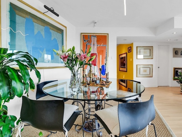 dining space featuring light hardwood / wood-style flooring