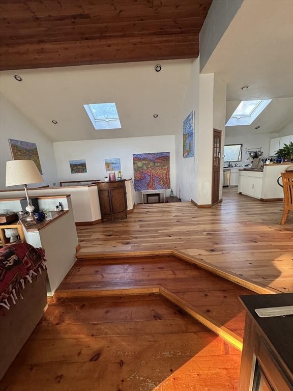 135 Marven Way, Wellfleet, MA 02667 - living area with a skylight and hardwood / wood-style flooring