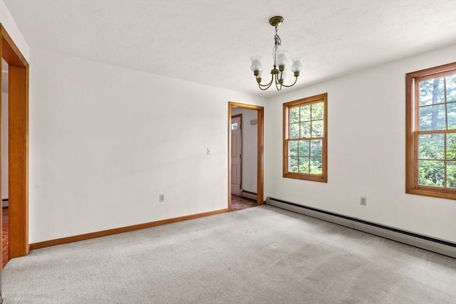 199 Old Westboro Rd, Grafton, MA 01536 - carpeted empty room featuring a chandelier and a baseboard radiator
