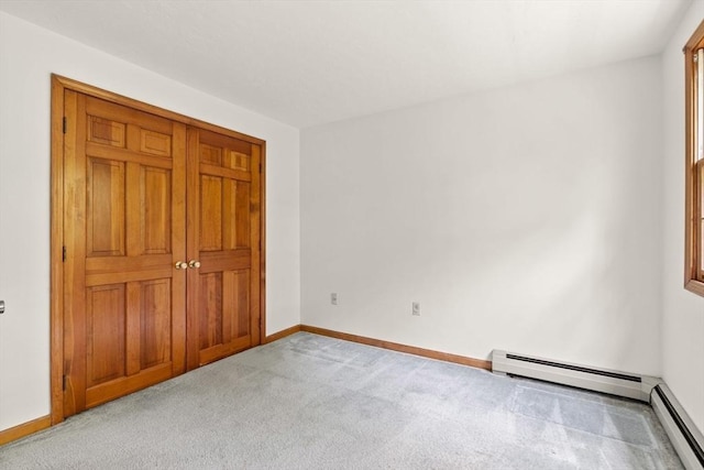 199 Old Westboro Rd, Grafton, MA 01536 - unfurnished bedroom featuring a baseboard heating unit and carpet