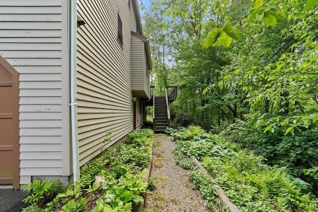 199 Old Westboro Rd, Grafton, MA 01536 - view of side of property featuring stairs and a vegetable garden