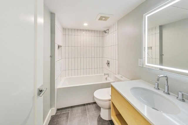 bathroom featuring toilet, bathtub / shower combination, vanity, tile patterned floors, and recessed lighting