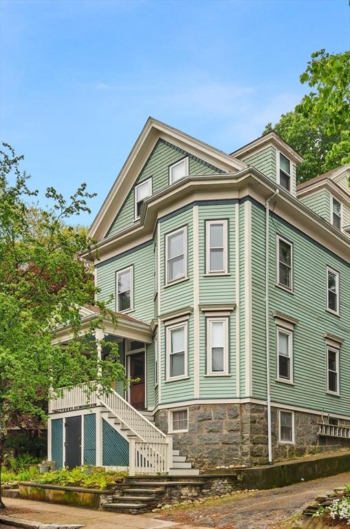 view of front of house featuring stairway