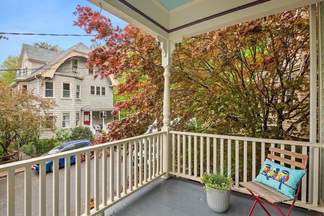 balcony featuring covered porch