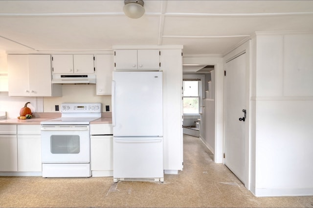 kitchen featuring white appliances, light carpet, and white cabinetry