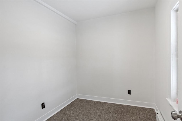 71 Water St, Quincy, MA 02169 - unfurnished room with dark colored carpet and baseboards