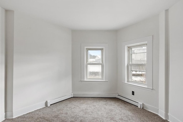 71 Water St, Quincy, MA 02169 - carpeted spare room with baseboards and a baseboard heating unit