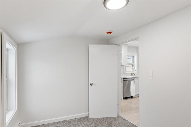 71 Water St, Quincy, MA 02169 - spare room with a sink, lofted ceiling, and baseboards