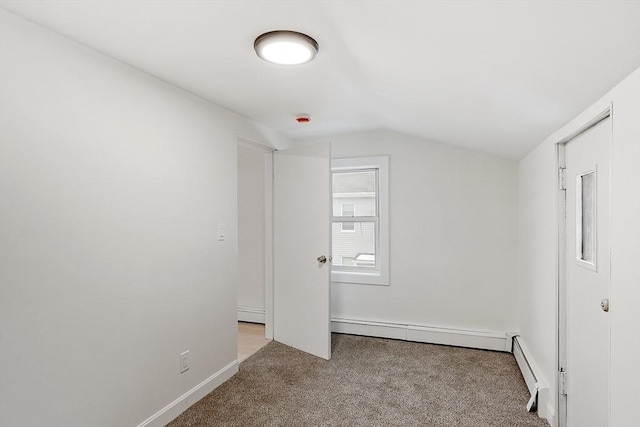 71 Water St, Quincy, MA 02169 - unfurnished bedroom featuring lofted ceiling, carpet flooring, a baseboard heating unit, baseboards, and a baseboard radiator