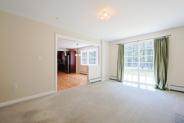 68 Dresser Hill Number 2 Rd, Dudley, MA 01571 - unfurnished room featuring light carpet and baseboard heating