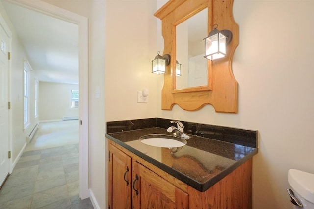 68 Dresser Hill Number 2 Rd, Dudley, MA 01571 - half bathroom featuring vanity and baseboard heating